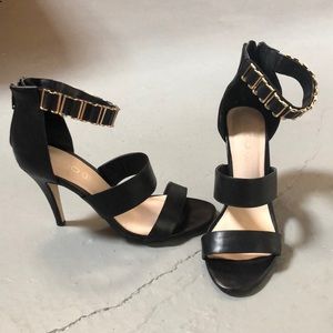 Size 9 Aldo black heals with gold ankle charms